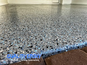 Quality Epoxy Garage Floor with Tan Base Saddle Tan Flakes Blend
