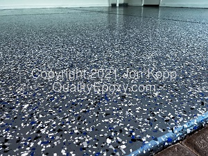 Quality Epoxy Garage Floor with Dark Gray Base Sky Blue Chip Blend